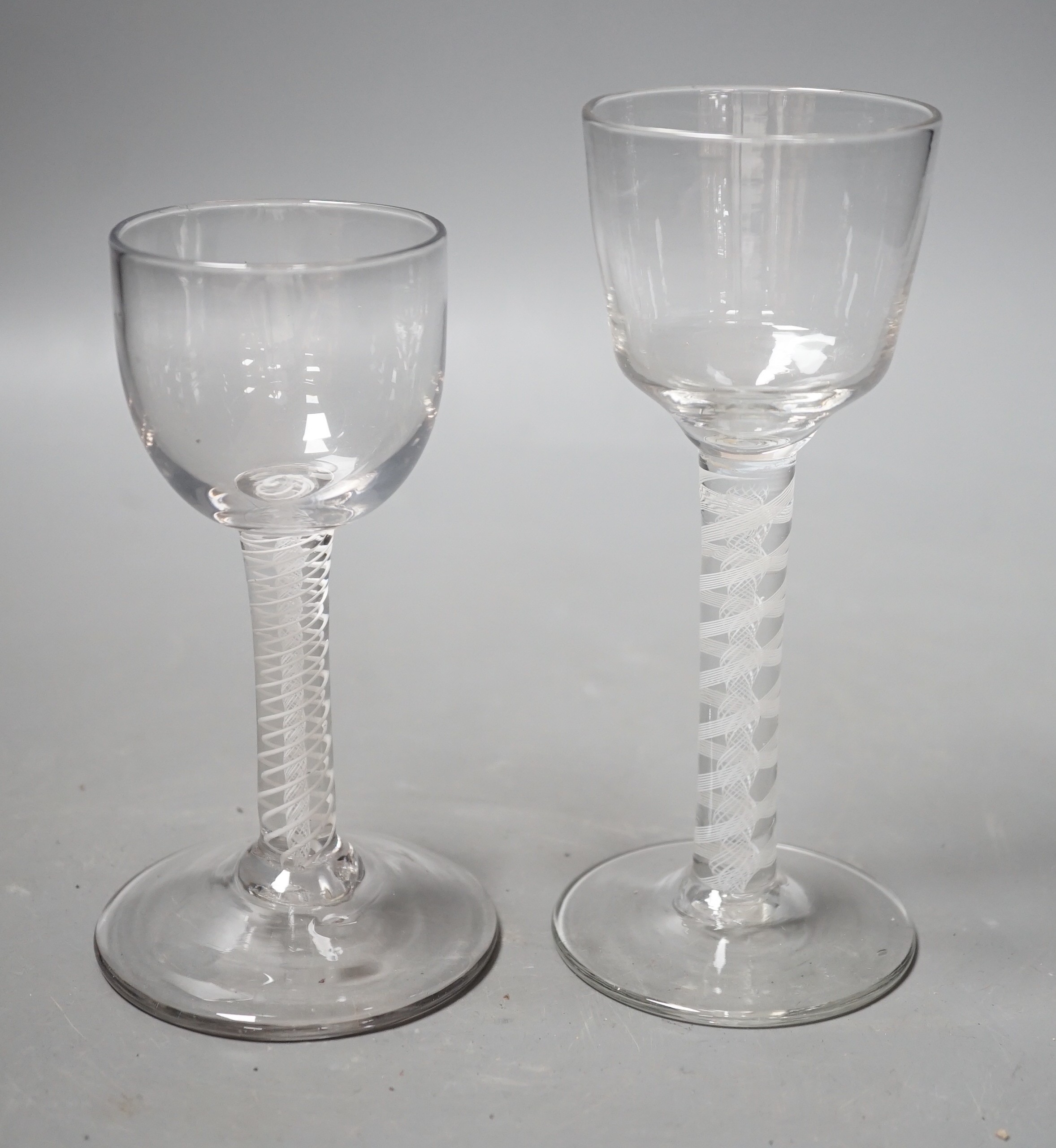 Two 18th century DSOT stem wine glasses, tallest 15cm